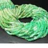Natural Shaded Green Chrysoprase Faceted Roundel Beads Strand Length is 14 Inches & Sizes from 4mm approx. Chrysoprase, chrysophrase or chrysoprasus is a gemstone variety of chalcedony (a cryptocrystalline form of silica) that contains small quantities of nickel. Called the stone of Venus, chrysoprase is the rarest and most valuable rich apple -green gemstone in the chalcedony family 